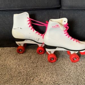 Hot Pink and White RollerDerby Roller Skates.